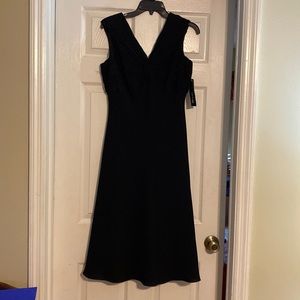 Black Crepe Lined Dress. Silk bodice.